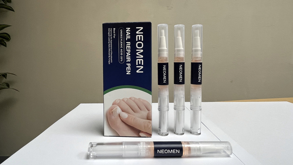 Neomen nail repair pens with product box on a desk